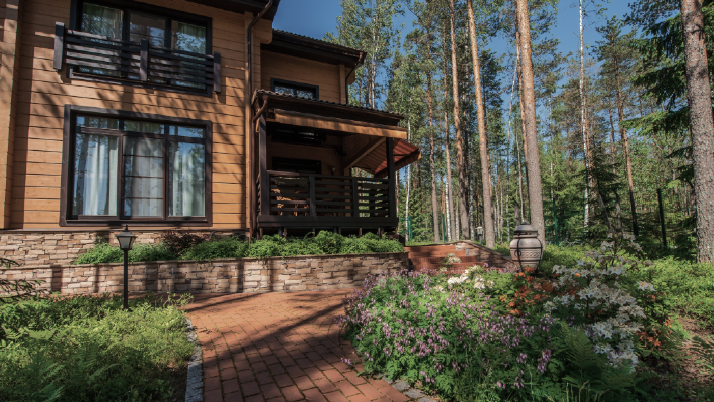 Современный ландшафтный дизайн, выполненный компанией Садовые решения