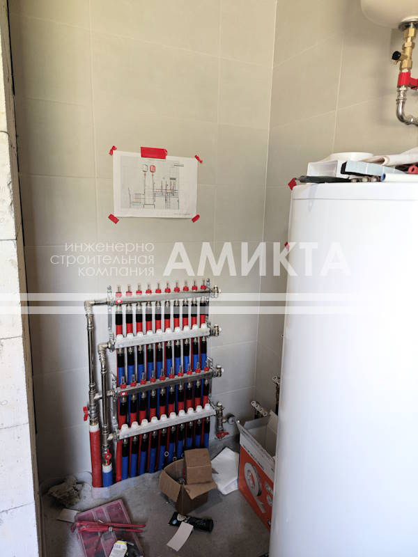 Монтаж коллекторов теплого пола в загородном доме в Московской области 