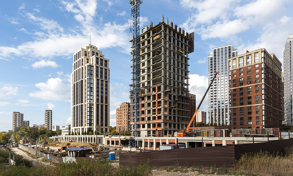 монолитно-кирпичный дом в Новосибирске — технология строительства новостройки