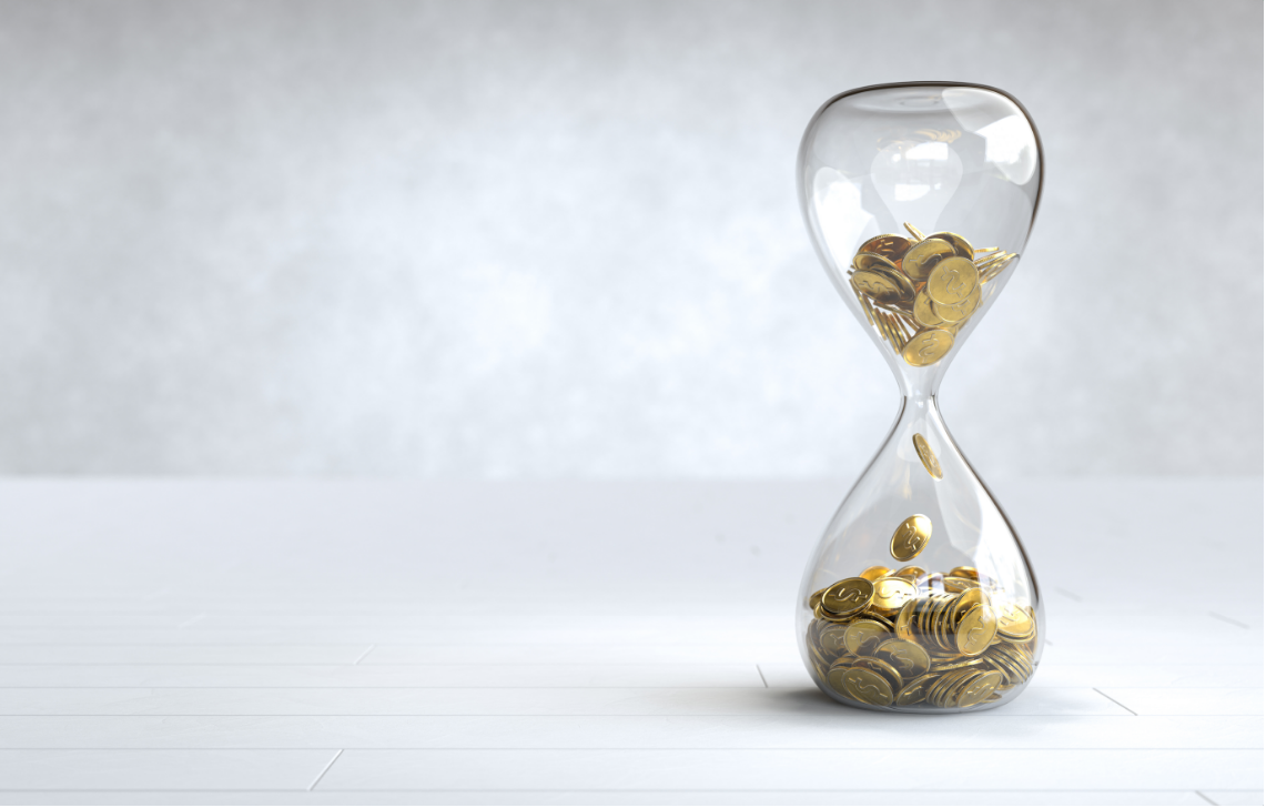 Trading Style: Hourglass filled with dollar coins instead of sand