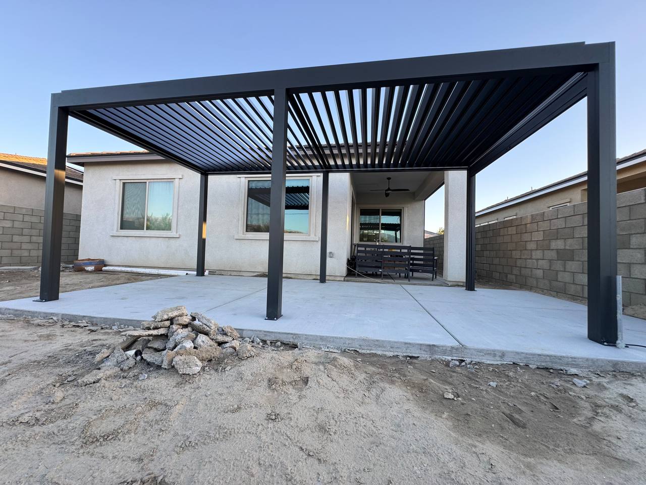 Completed 10 by 19 foot motorized louvered pergola in Yorba Linda with the louvers open