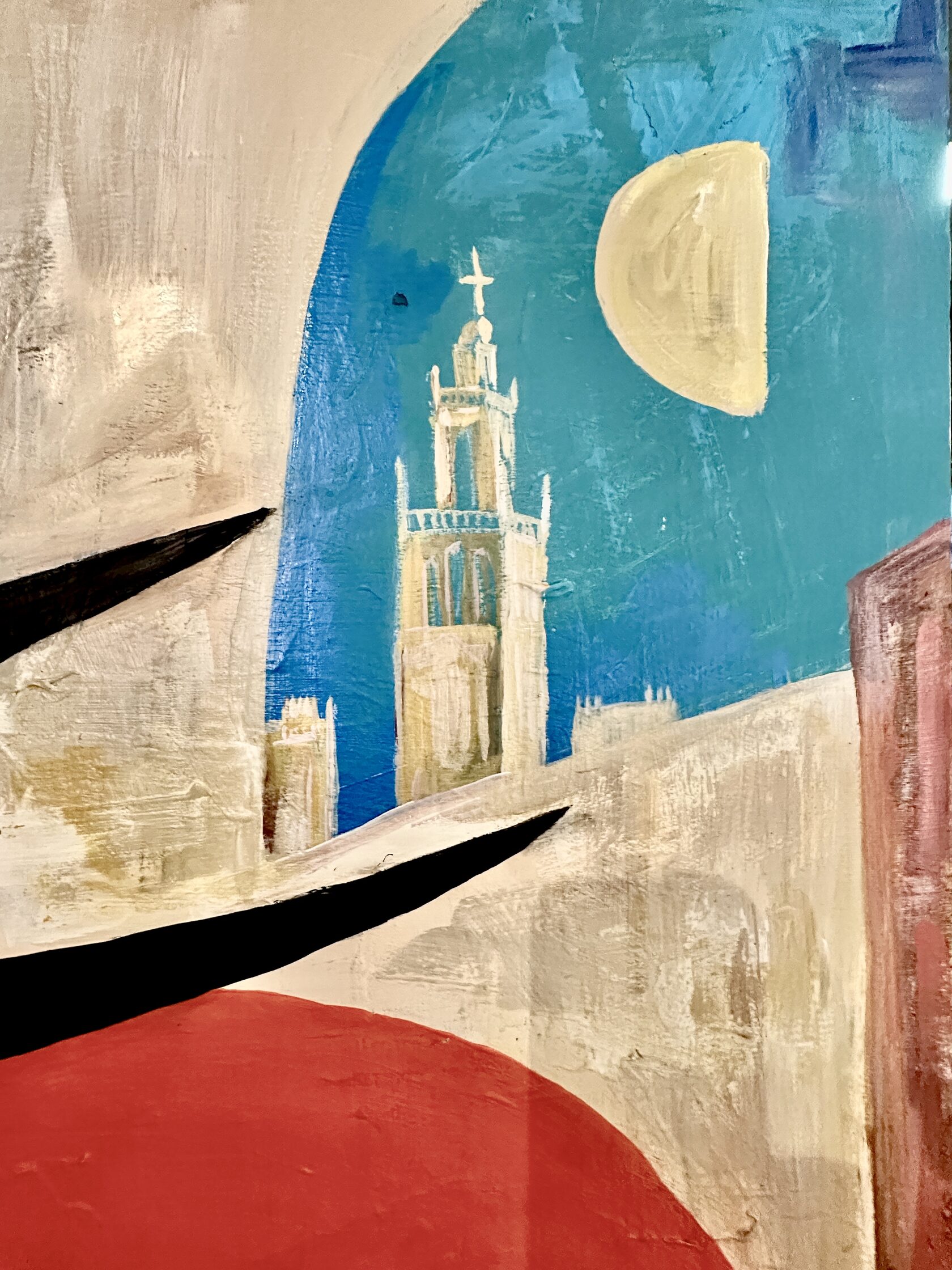Sevilla detail — blue architectural opening and tower