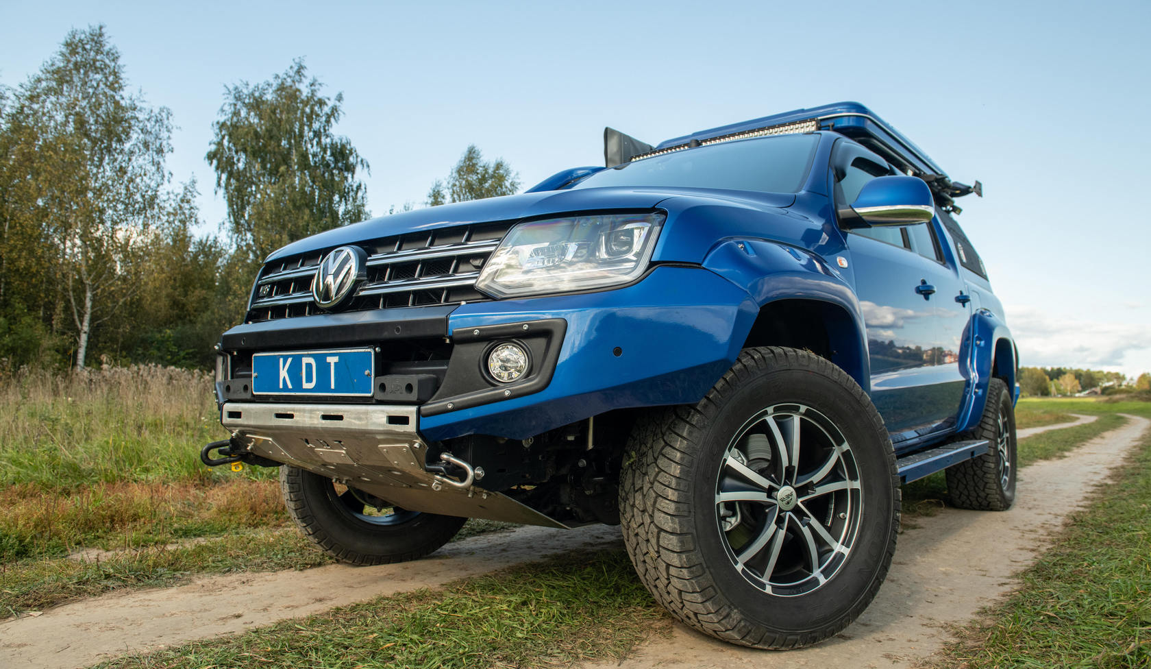 Бампер фольксваген амарок. Бампер силовой передний Volkswagen Amarok. Фольксваген Амарок экспедиционный. КДТ тюнинг внедорожников. Фольксваген Амарок с кунгом.