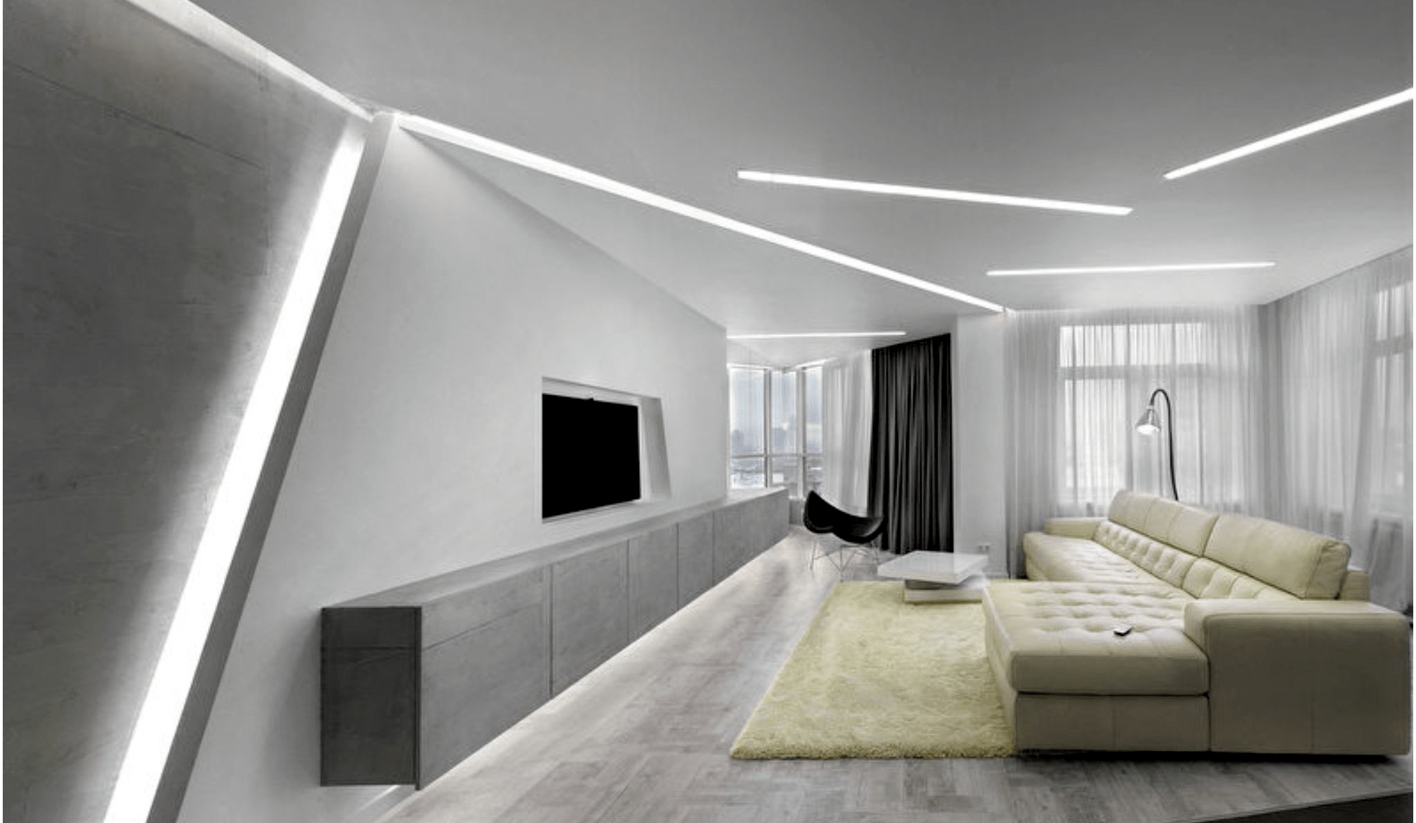 серый натяжной потолок в интерьере гостиной