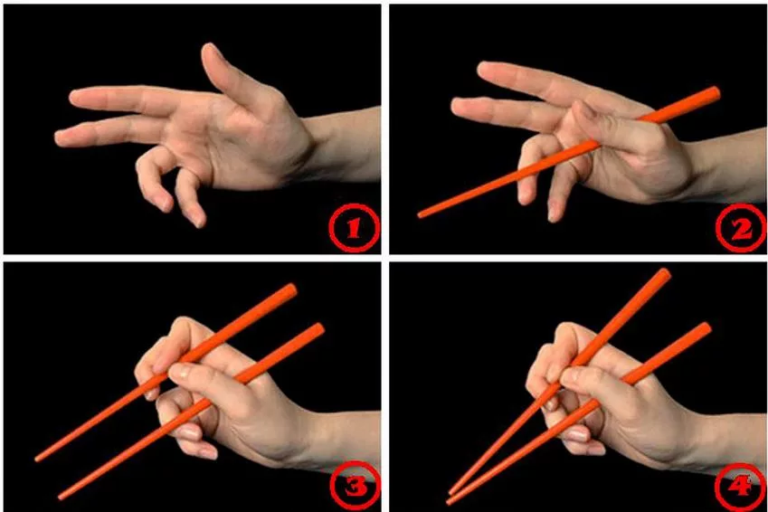 Как правильно держать палочки для суши и роллов фото