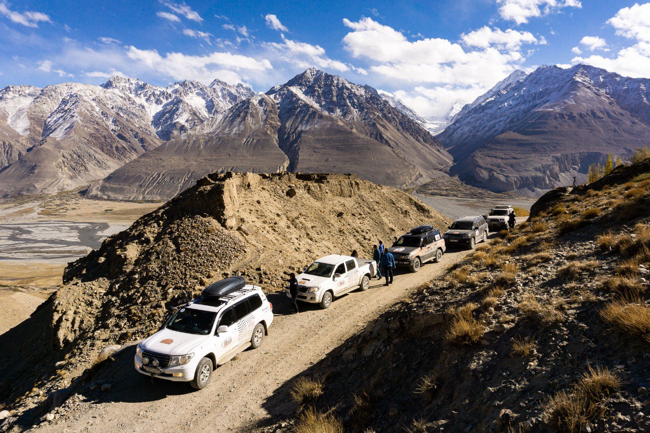A convoy of jeeps in the mountains of Kyrgyzstan