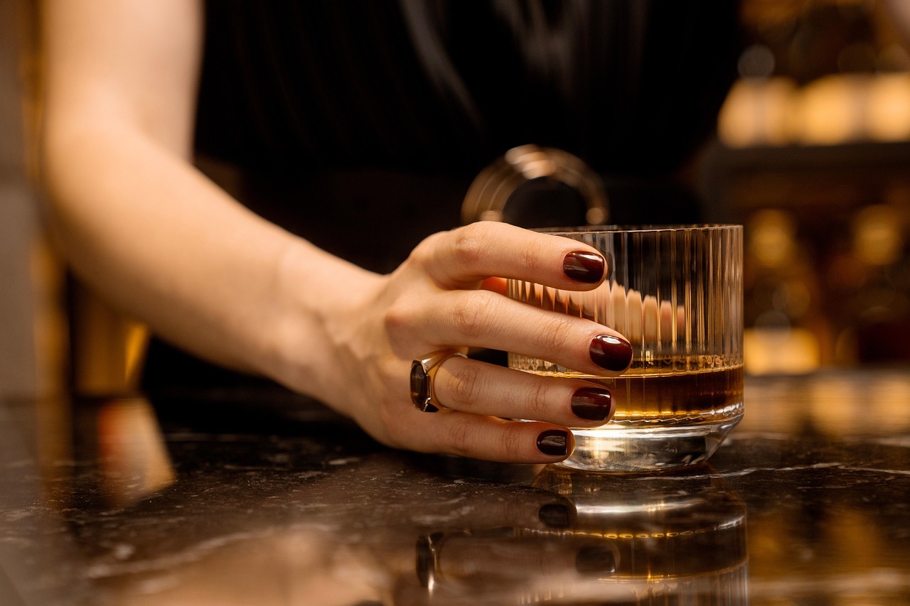 A Lady with Glass of Vodka