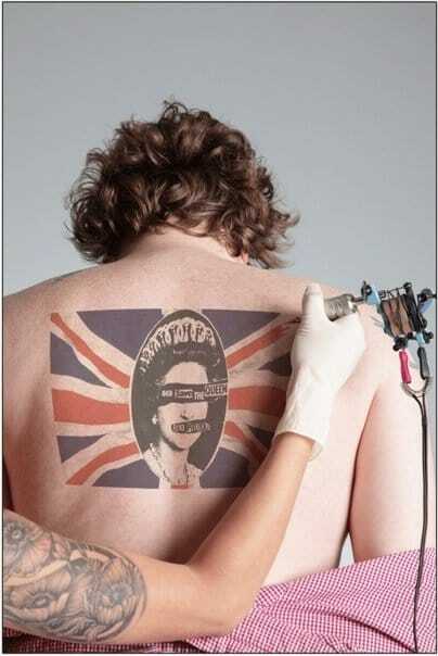 Тату рок на спине: фото татуировок