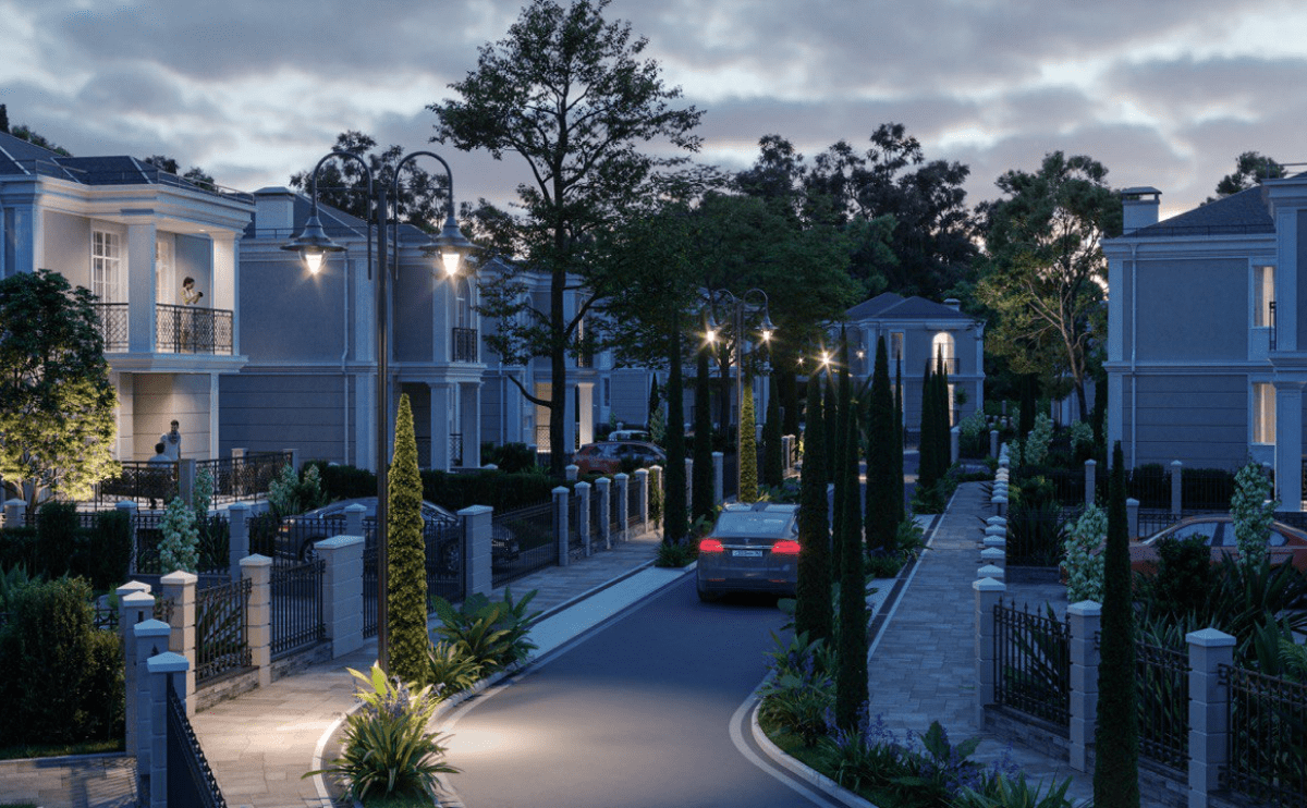 Улица при вечернем освещении в коттеджном поселке Солнечные Сады