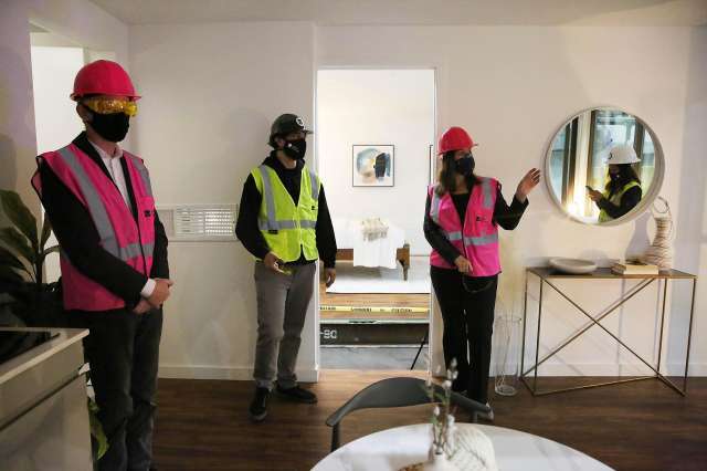 Oakland Mayor Libby Schaaf (right) and Darin Ranelletti (left), policy director for housing security, tour a Mighty Duo B with Zayn El Hajji (center), projext manager, at Mighty Buildings on Friday, November 6, 2020 in Oakland, Calif. Photo: Lea Suzuki, The Chronicle