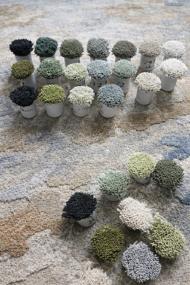 Yarn color and texture swatches on a rug