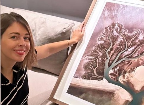 Natali Apraksina with her photo portal at home
