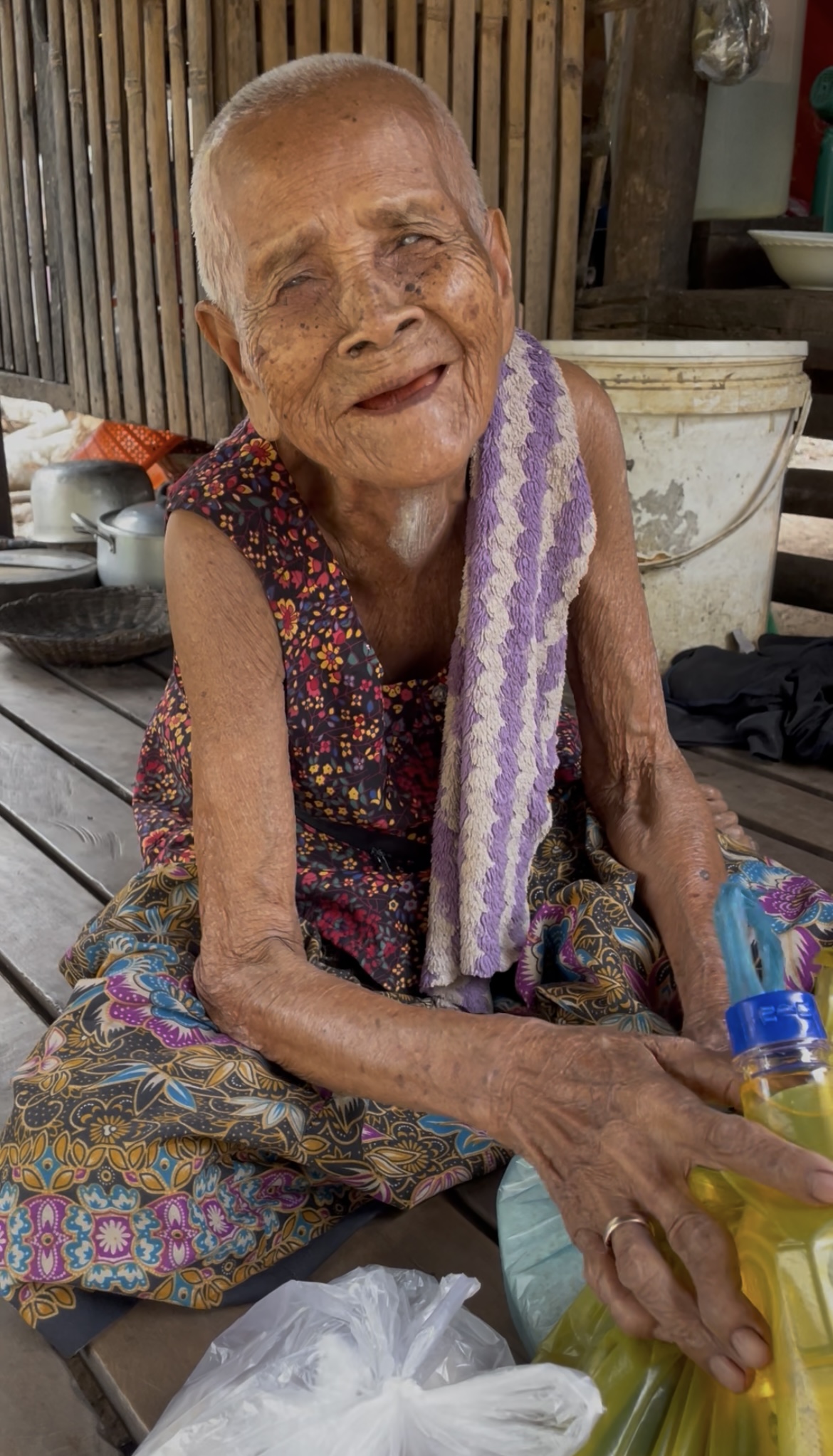 Volunteers distributing food to elderly villagers