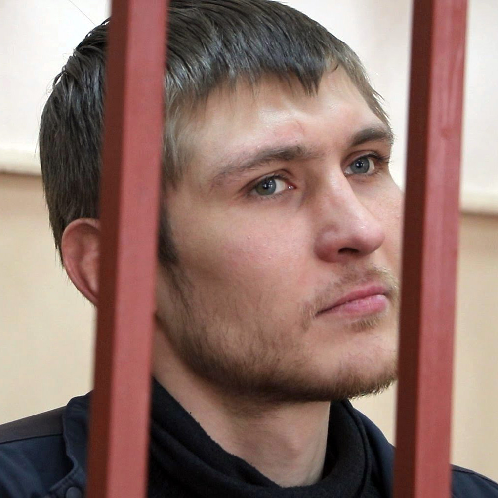 (3) Maksim Panfilov was the most recent to be arrested, just this April. He’s charged under Criminal Code 2.212 for mass riots and 1.318 for assaulting government authority. Maksim suffers from Tourette’s Syndrome. He’s currently in SIZO-5 in Moscow. ~