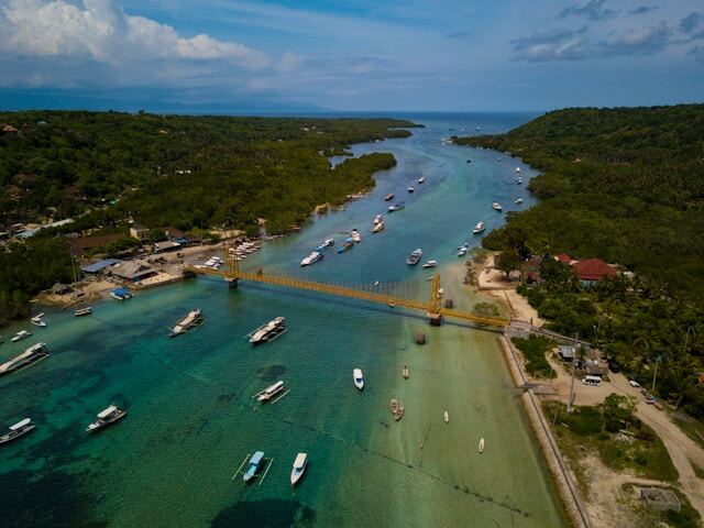 Yellow Bridge connecting Nusa Lembongan and Nusa Ceningan during sunny weather
