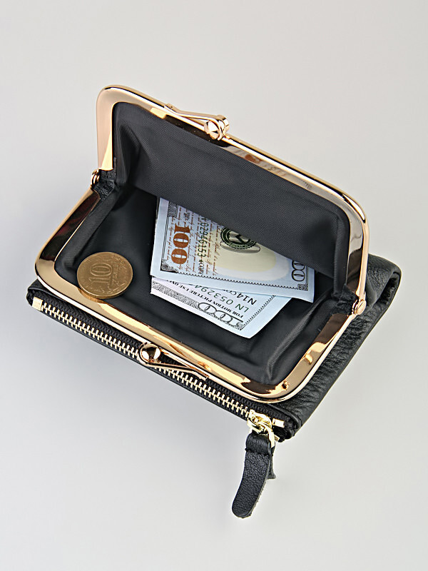 Кошелек женский. Изделие выполнено из натуральной мягкой кожи. Закрывается на магнит.