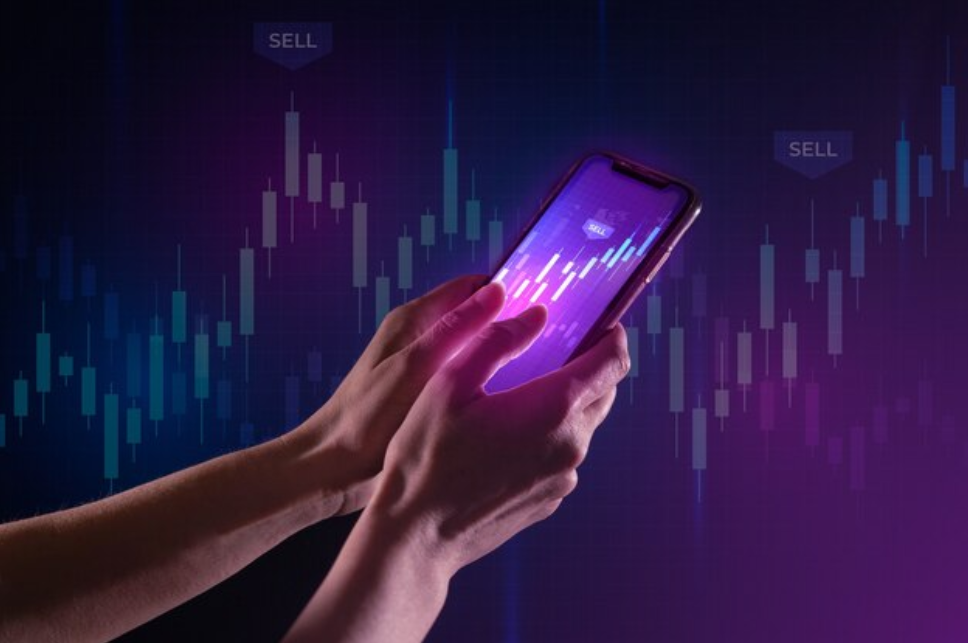  Intraday short selling: a person doing short trading with a phone
