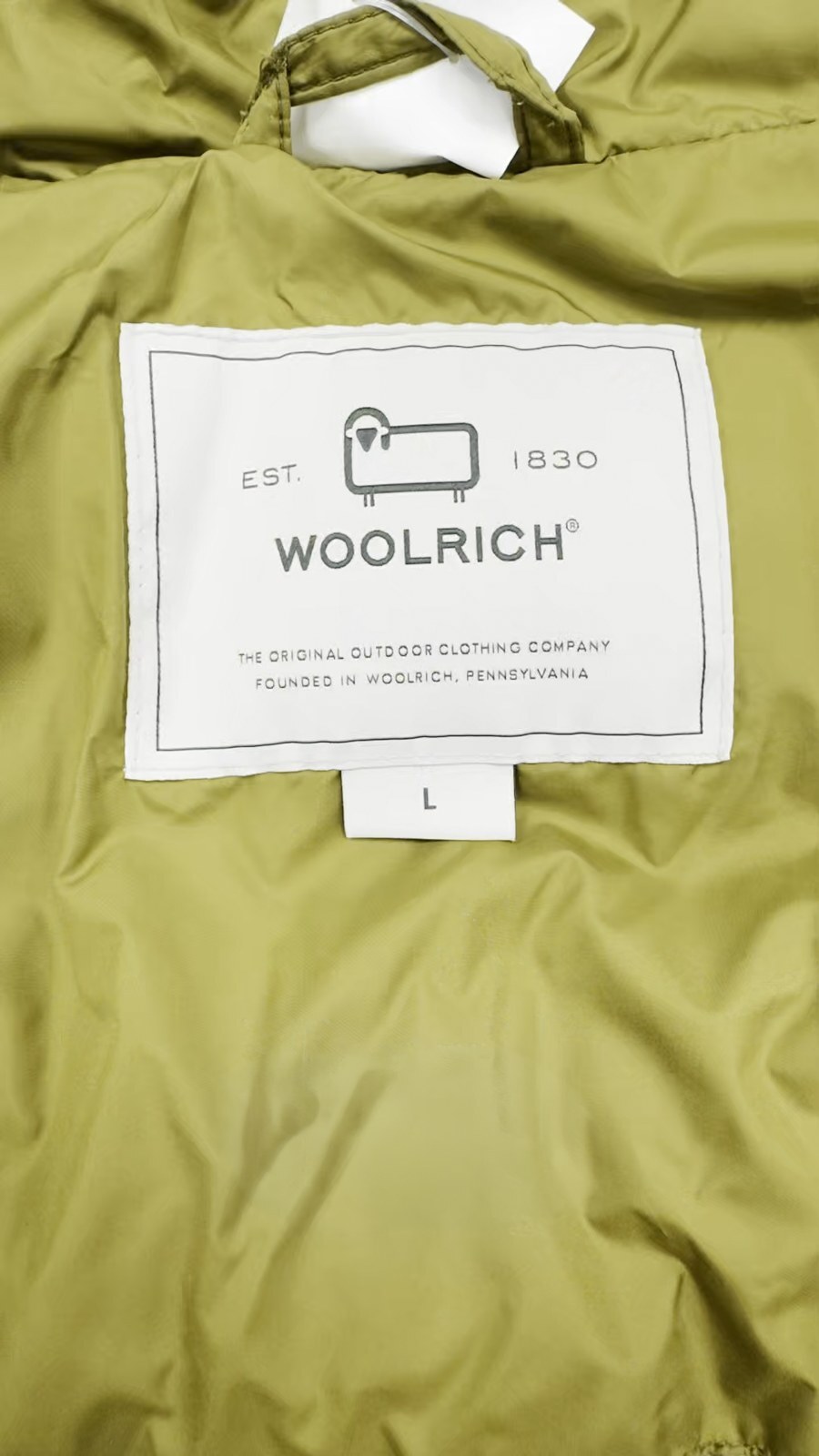 Фирменная этикетка Woolrich.