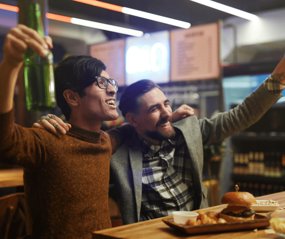 two people watch football in Eden Hookah