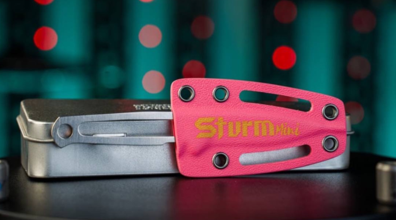 Kizlyar Supreme compact knives with pink Kydex sheaths