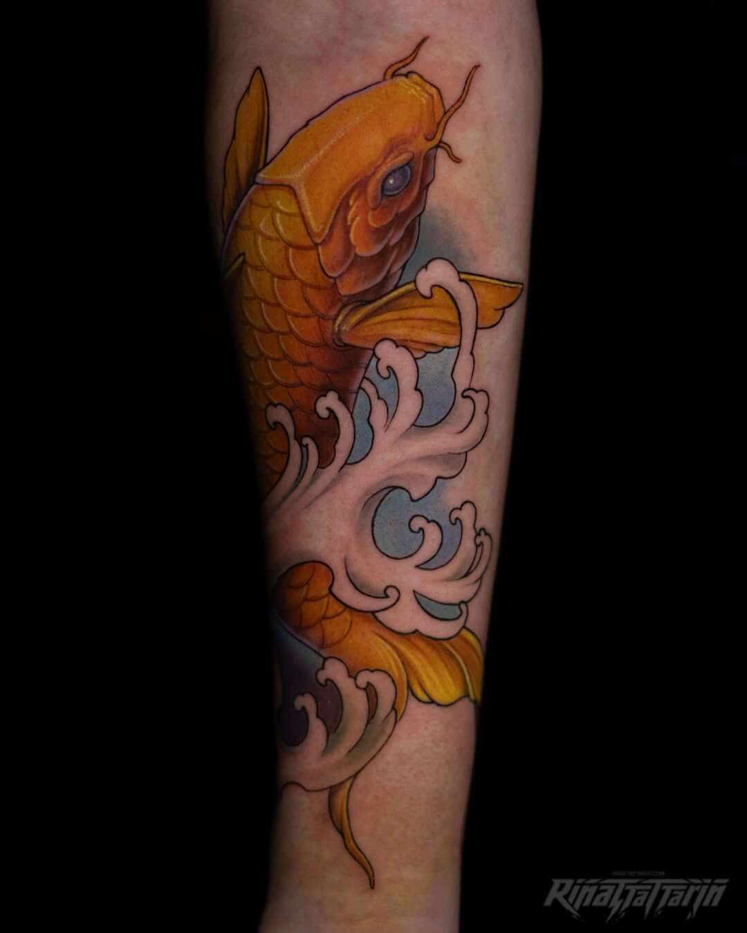 Japanese Neo-Traditional forearm tattoo featuring a detailed golden Koi fish leaping through grey and blue water splashes, by Rinat Mingazdinov, Los Angeles