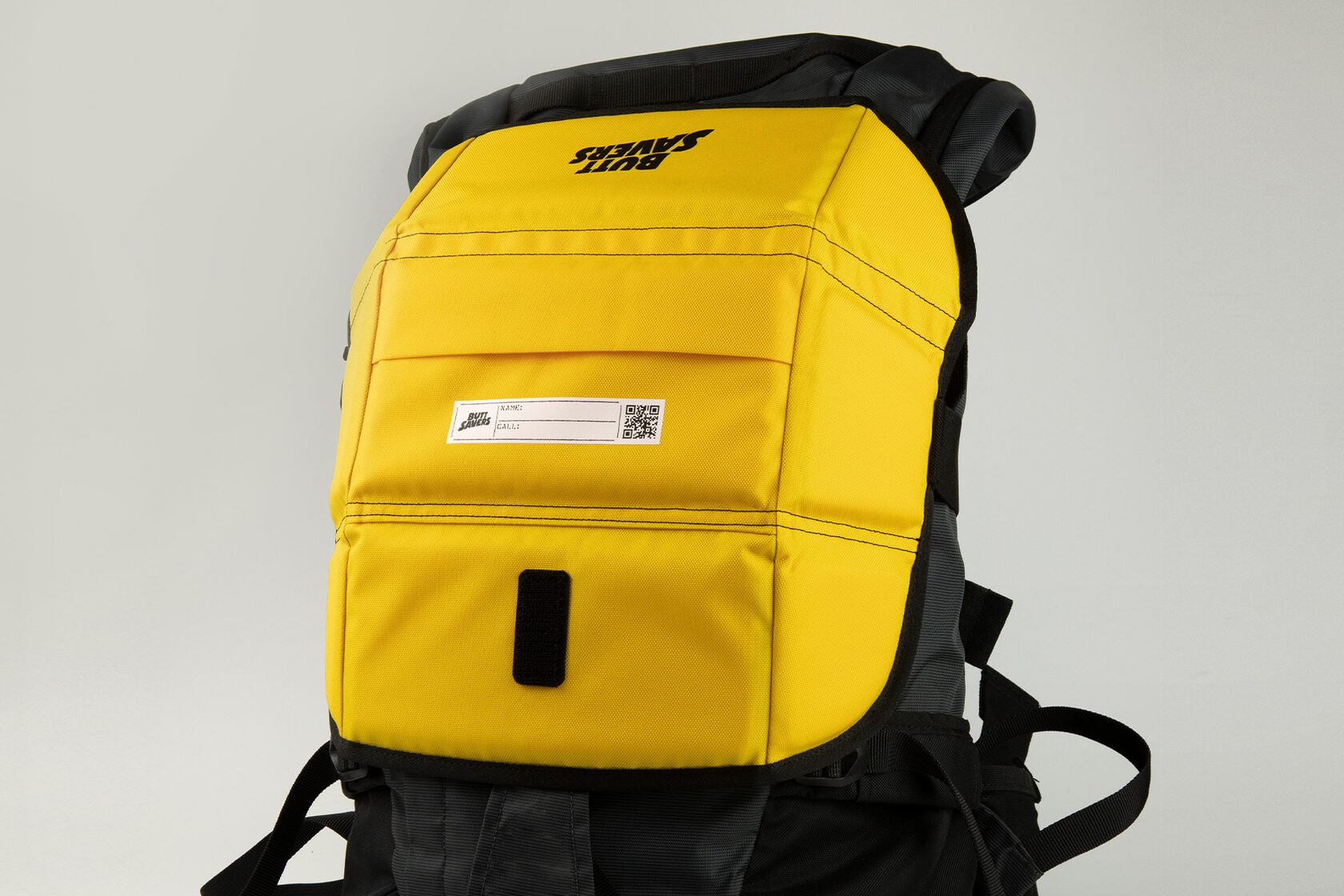 Поджопник с карманом на рюкзаке