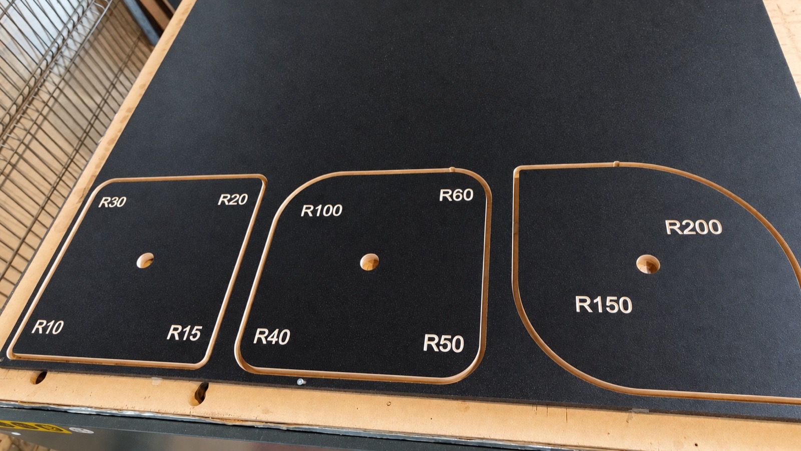 Machined reference board showing corner radii from R10 to R200