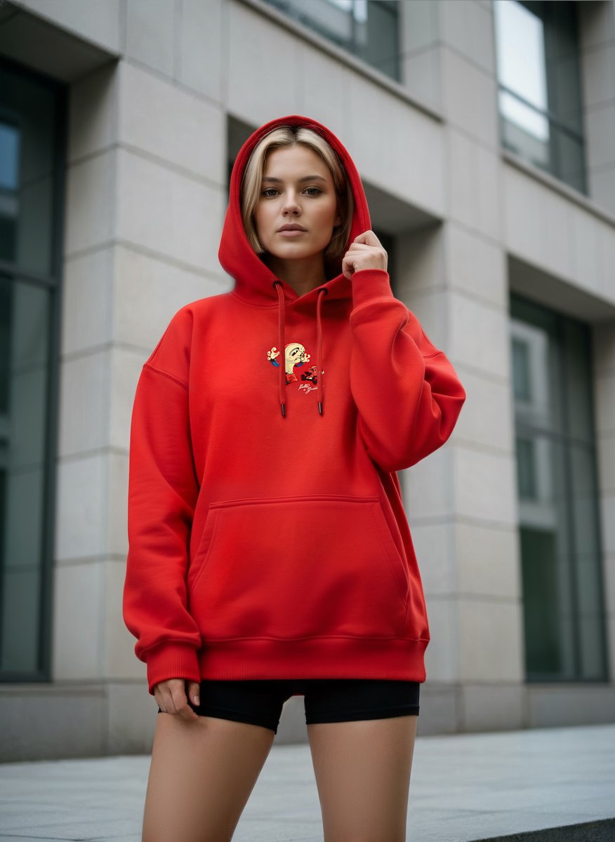 девушка в красном худи с капюшоном на фоне здания генерация фото