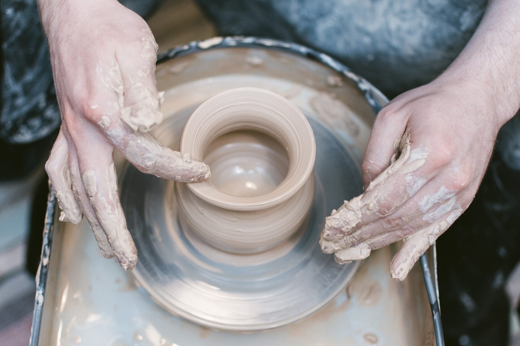 easy stress relief hobby in Toronto, pottery wheel therapy compared to hockey or fishing