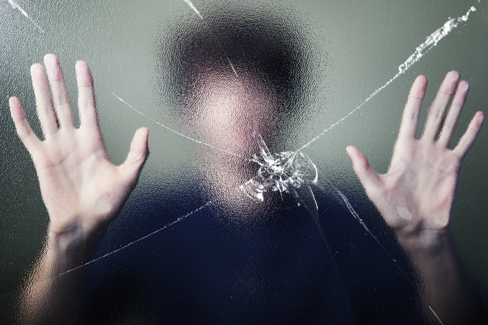 A person being controlled in a relationship, illustrating coercive control as a form of domestic violence and emotional abuse.