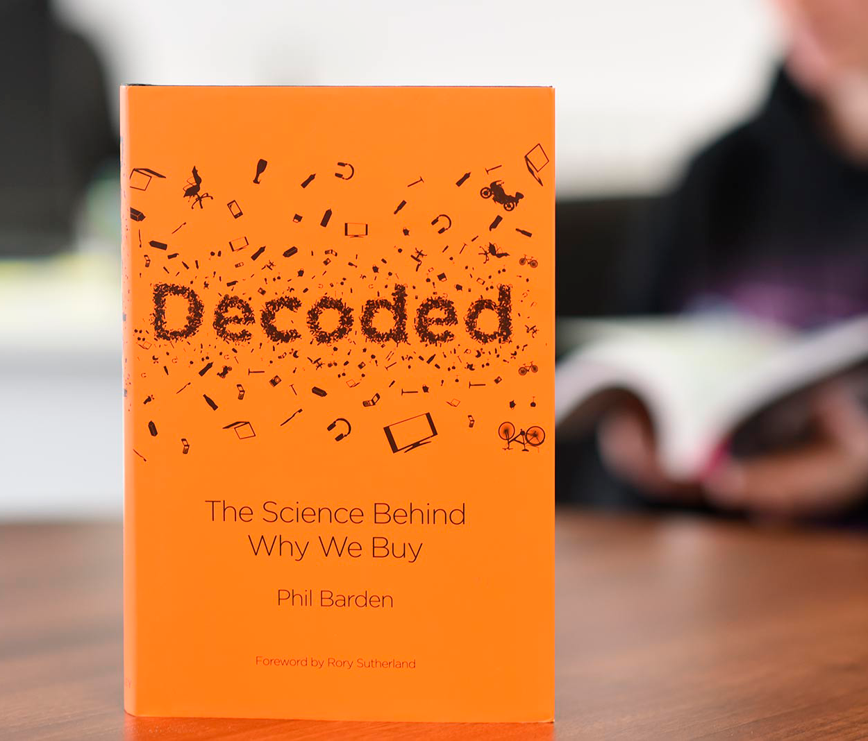We bought new books. Фил Барден. "Decoded: the Science behind why we buy" Phil Barden. *Decoded* by Phil Barden..