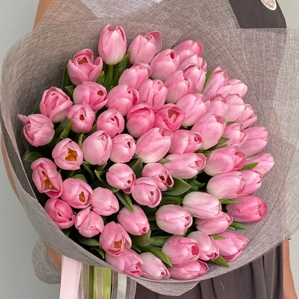 Lovely tulips bouquet arranged in our signature style.