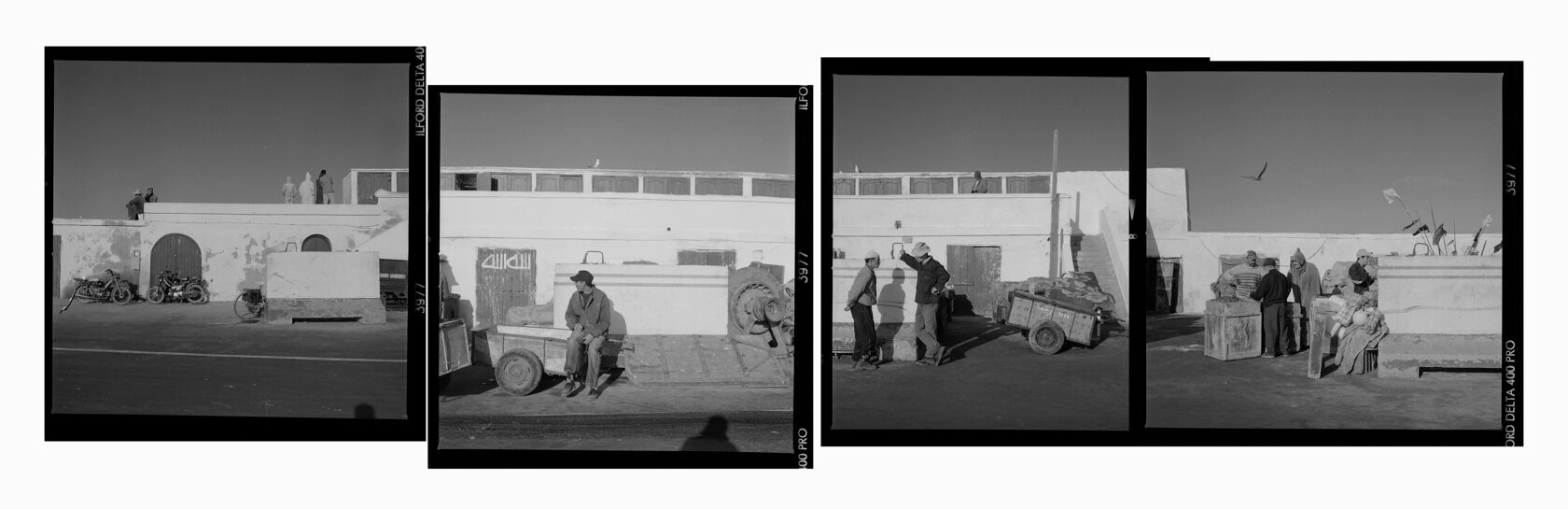 Fishermen in the port. Essaouira. Morocco. BW negative 6x6