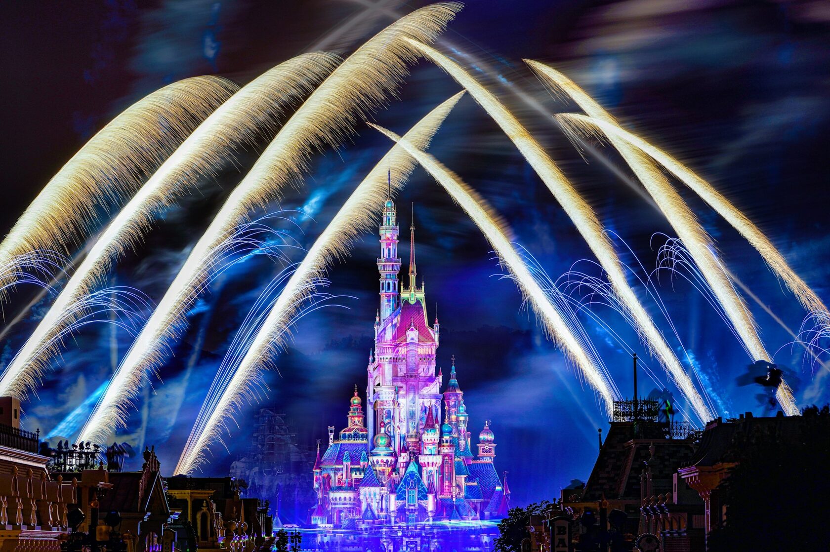 Hong Kong Disneyland Castle of Magical Dreams illuminated at night