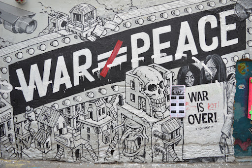 war not equal to peace poster on the wall