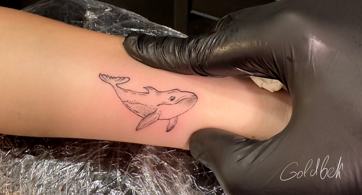 Tiny Whale Tattoo