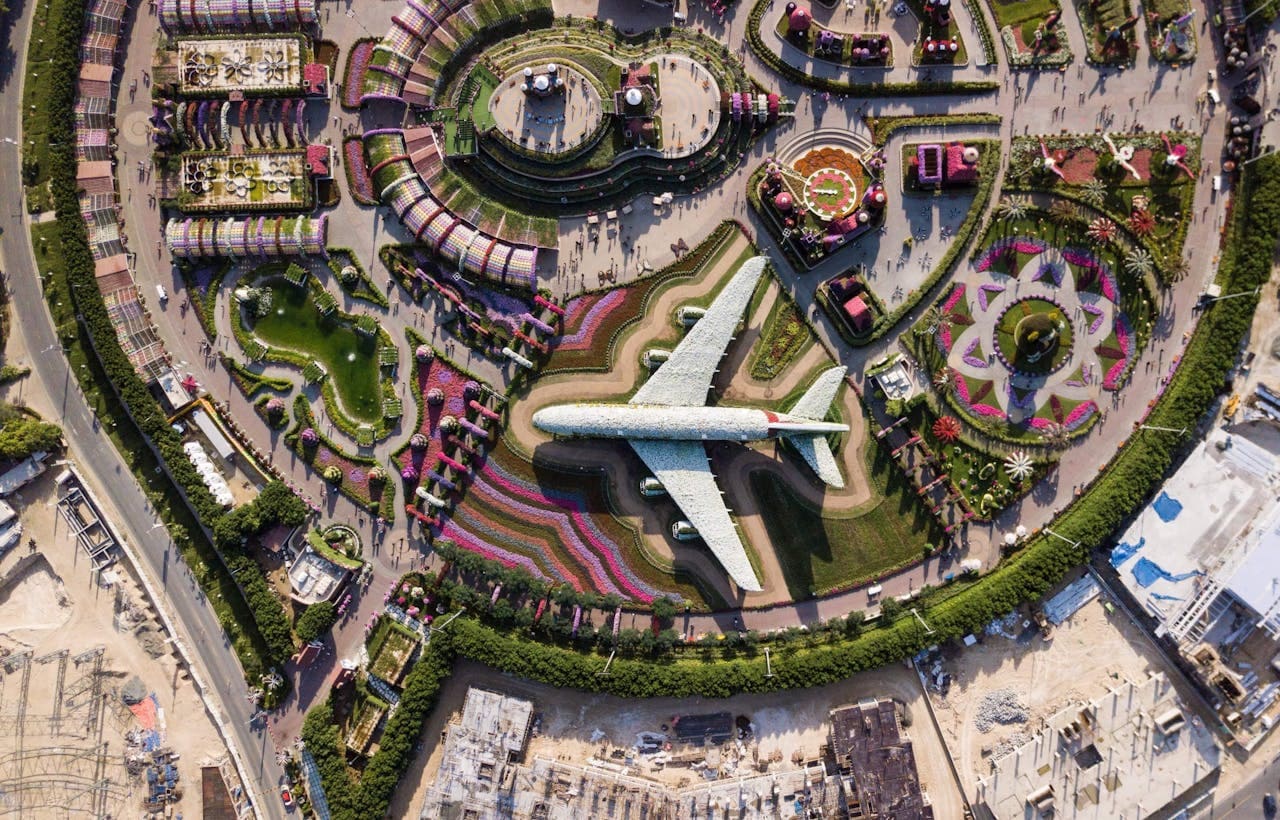 Aerial view of airplane in Dubai for 2025 visa updates for UAE residents by Slotby&amp;#39;s