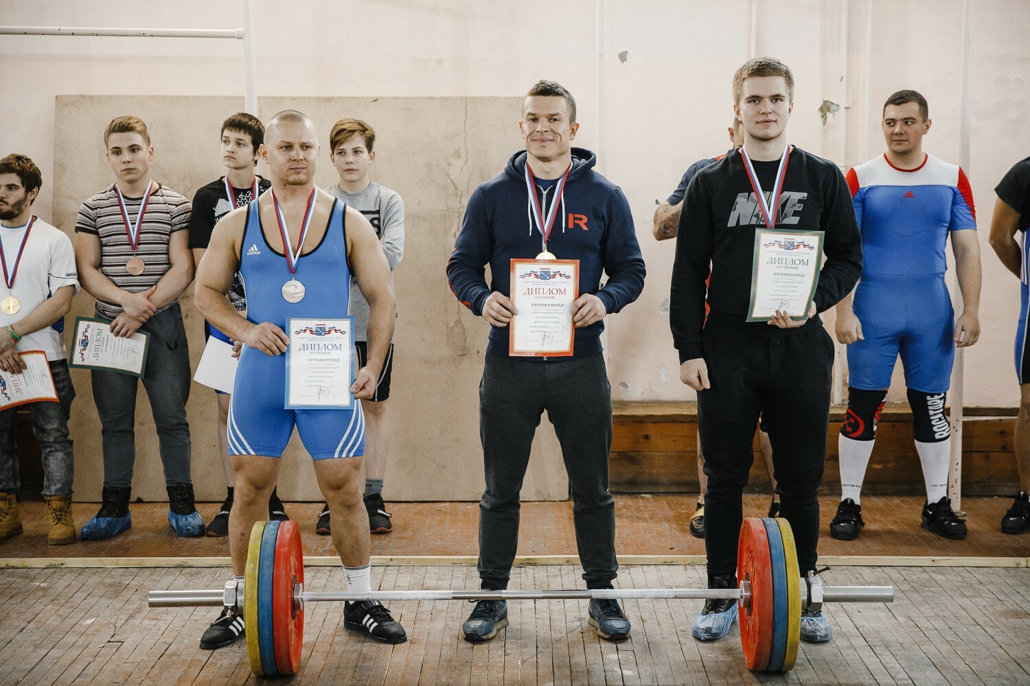 Лен обл спорт. Группа силачей.