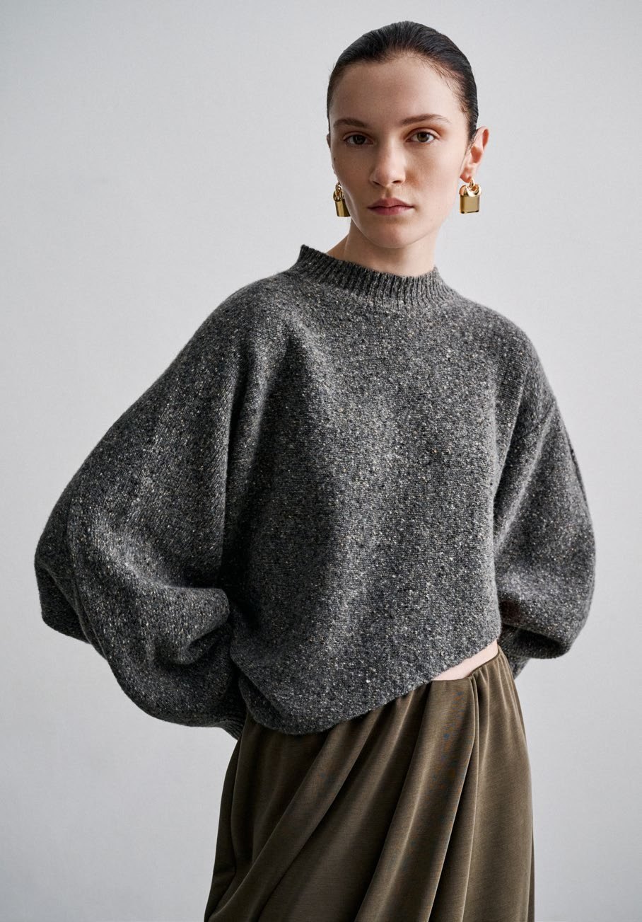 SU: voluminous grey wool sweater and olive skirt