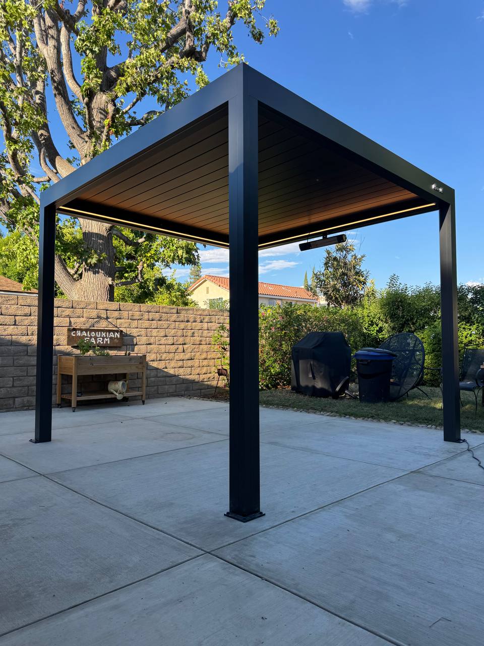 Costa Mesa motorized pergola with closed louvers and integrated perimeter LED lighting