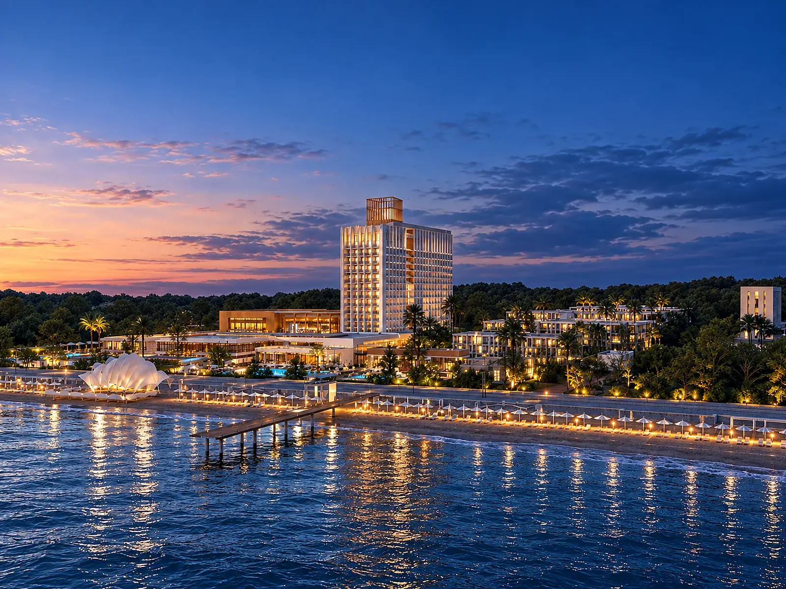 Общий вид Volna Resort на закате у моря