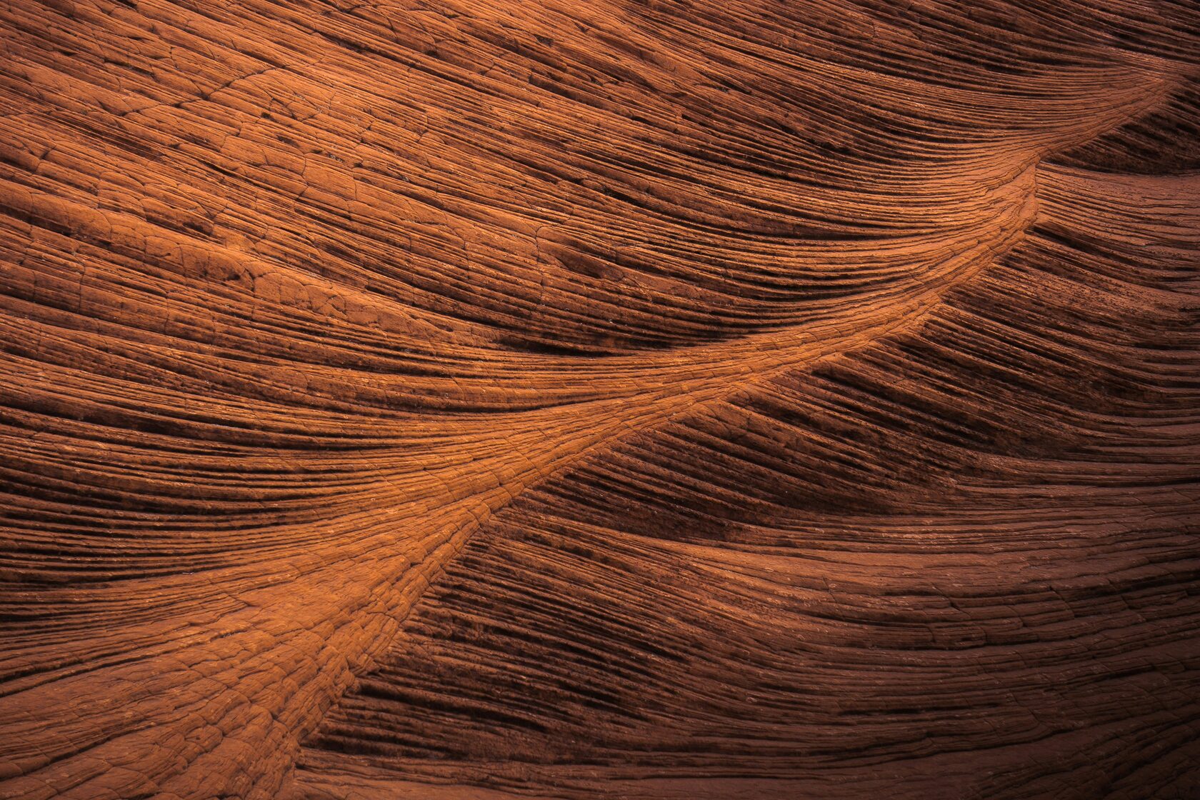Orange layered rock formation texture