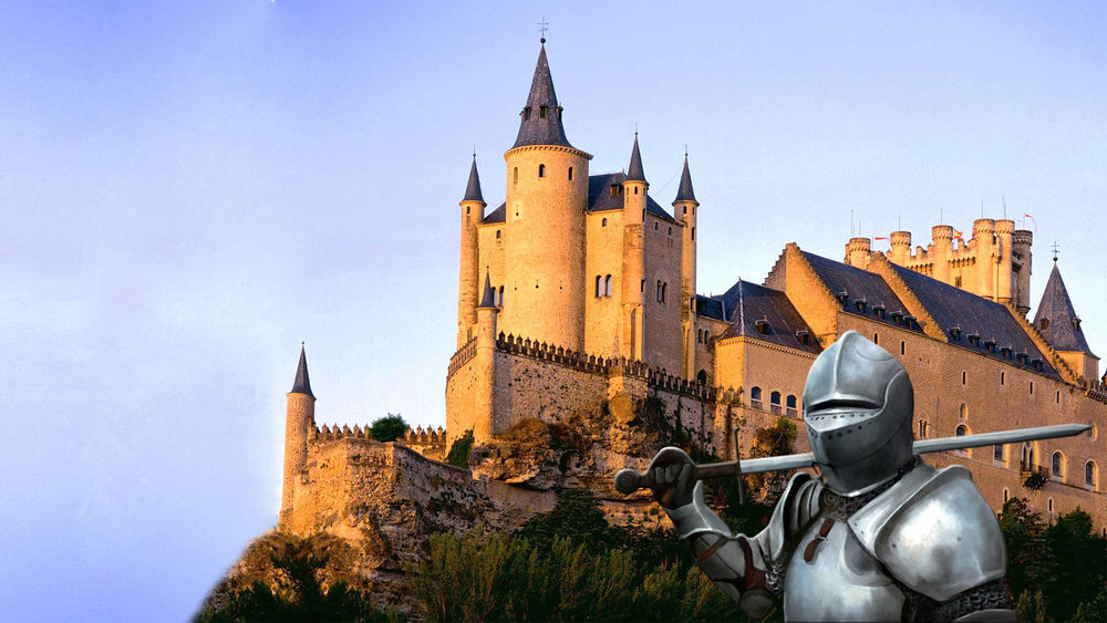 Средневековый замок с оборонительными стенами и башнями, символ власти сеньоров и жизни рыцарства