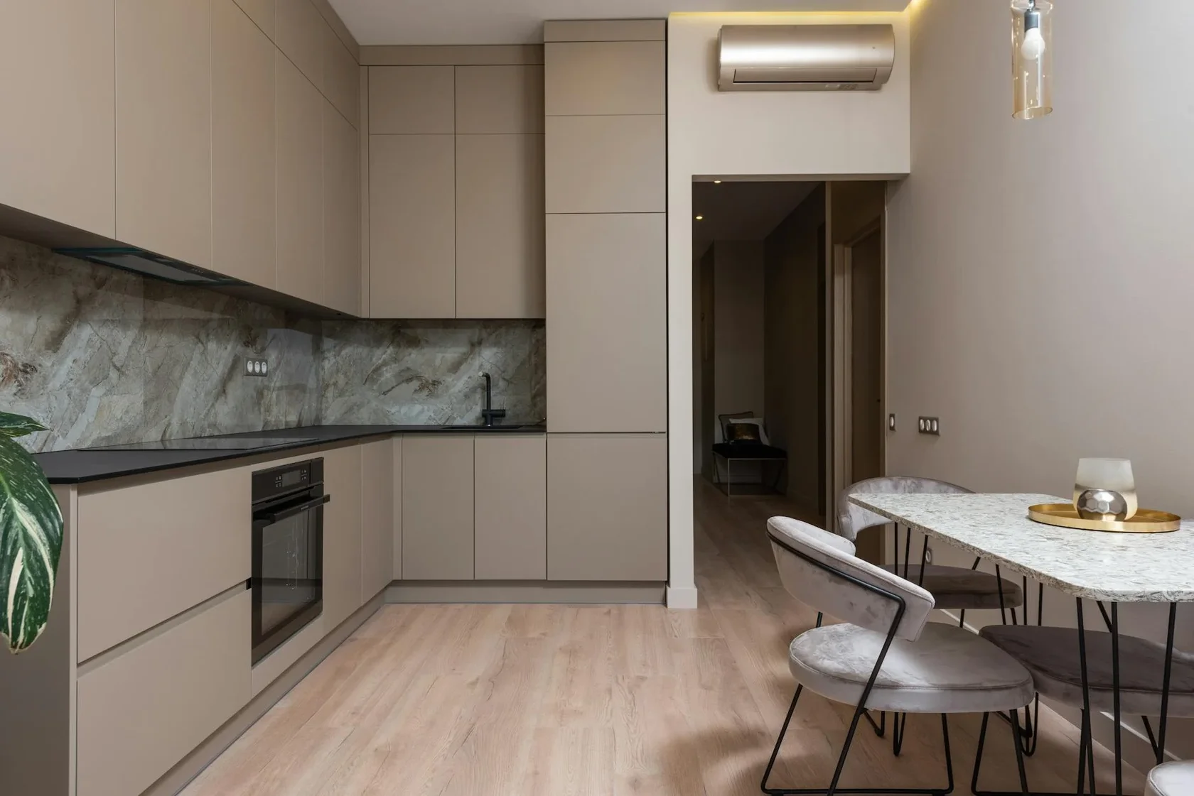 Contemporary kitchen with modern cabinets and sleek decor in a minimalist style.