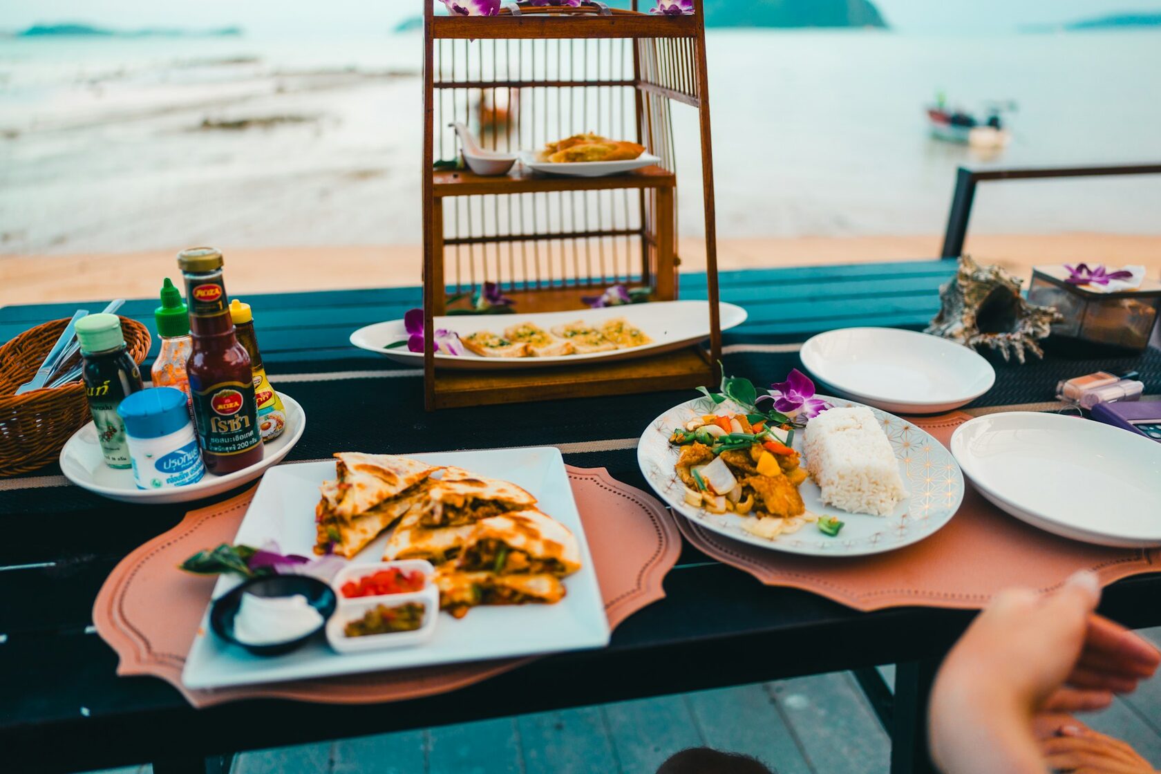 Beachfront restaurant with ocean views and candlelit dining