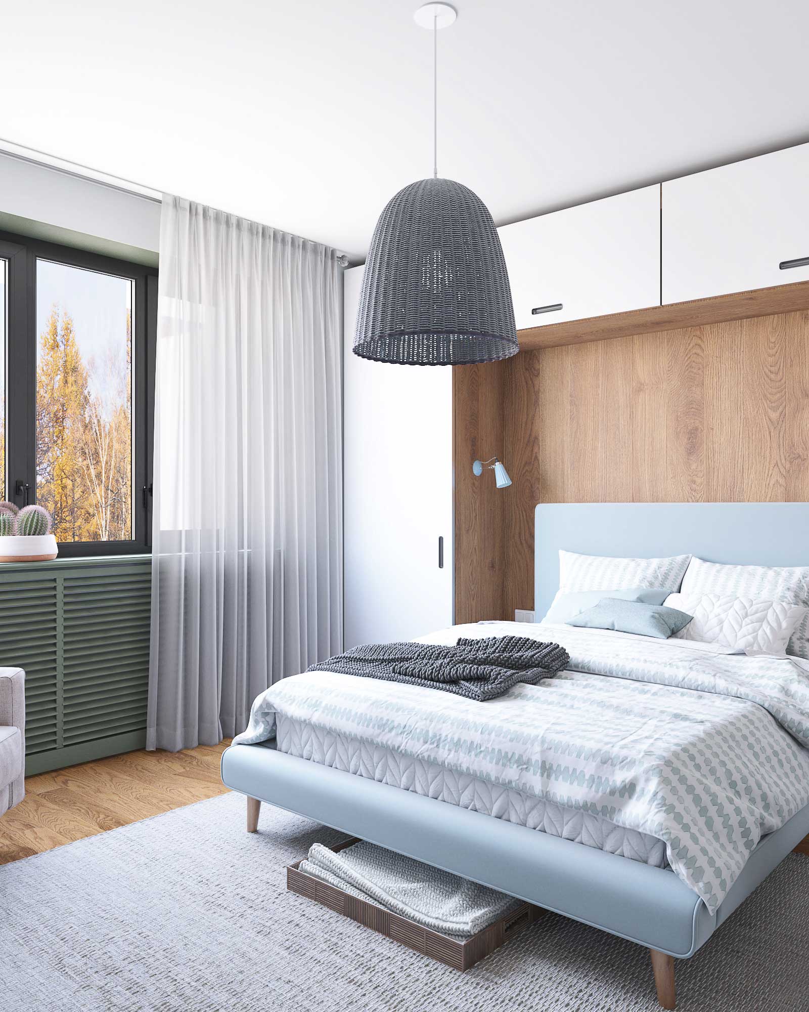 Спальня с белыми стенами, скандинавской кроватью, шкафы по бокам от кровати.