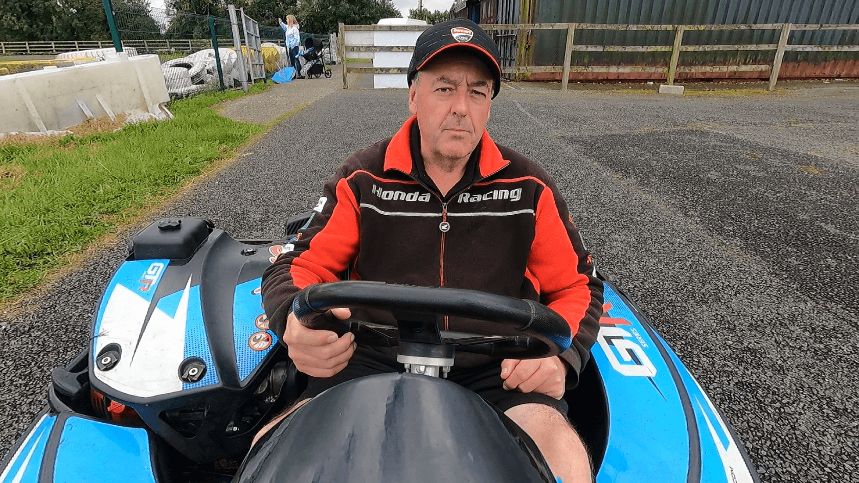 Athboy Karting track owner seated in a go-kart, ready for action