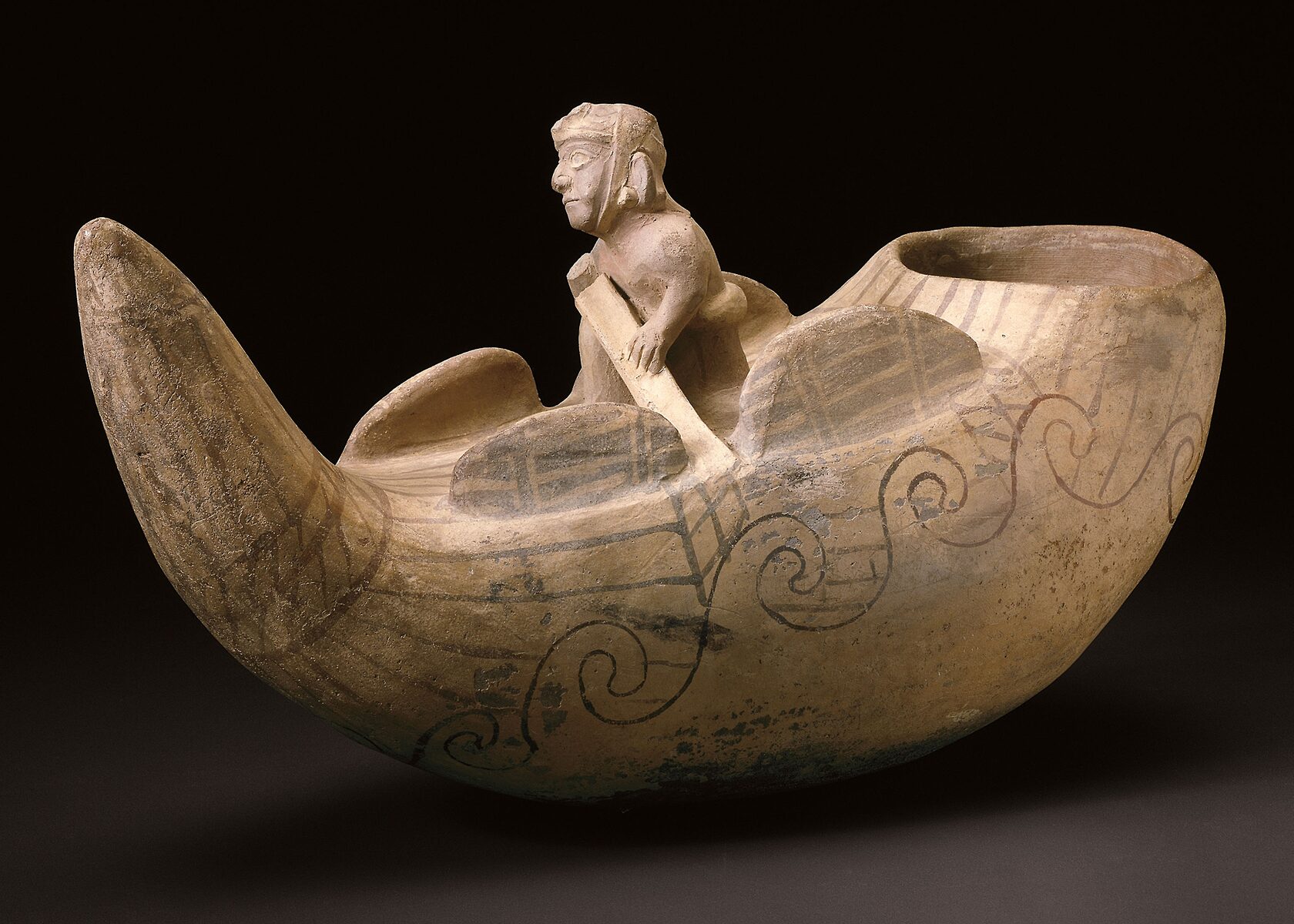Сосуд в виде лодки с рыбаком. Моче, 100 гг. до н.э. - 500 гг. н.э. Коллекция The Art Institute of Chicago.