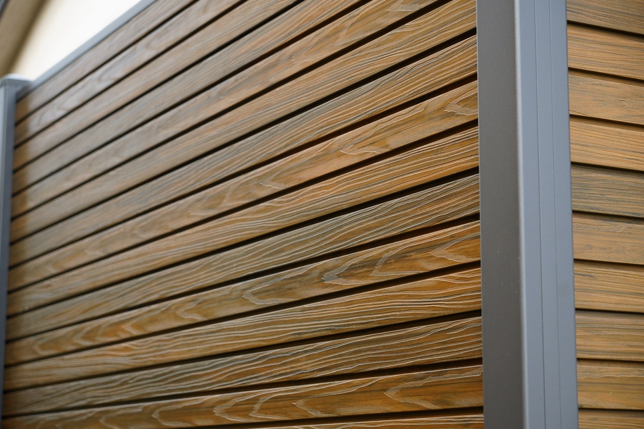 Close-up of WPC fence panel texture and post detail