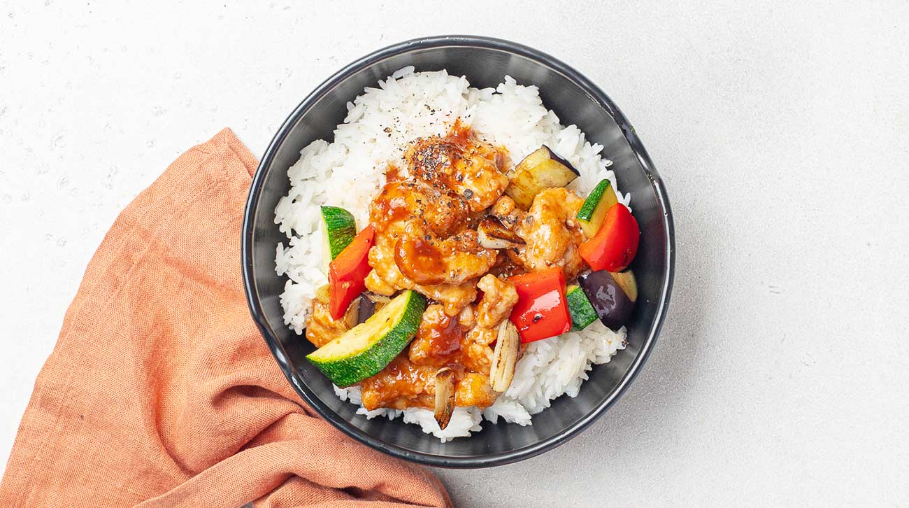 Хрустящие кусочки мяса в кисло-сладком соусе